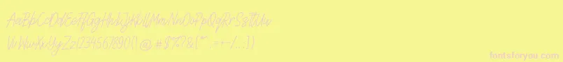Lettia Font – Pink Fonts on Yellow Background