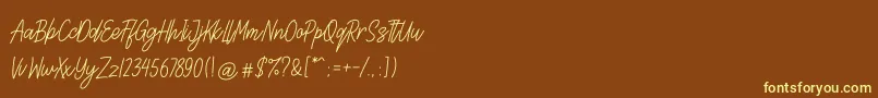 Lettia Font – Yellow Fonts on Brown Background