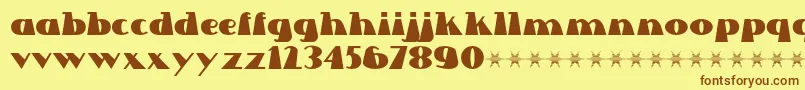 フォントLettre Dans Le Decor – 茶色の文字が黄色の背景にあります。