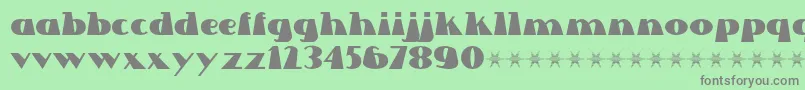 Lettre Dans Le Decor-fontti – harmaat kirjasimet vihreällä taustalla