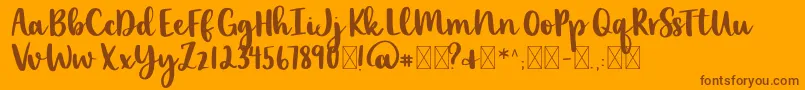 Więcej informacji o czcionce lexi new Czcionka lexi new – brązowe czcionki na pomarańczowym tle