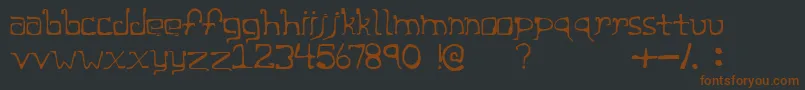 Шрифт CageRegular – коричневые шрифты на чёрном фоне