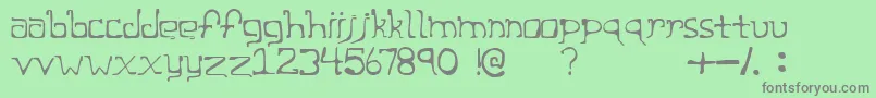 CageRegular Font – Gray Fonts on Green Background