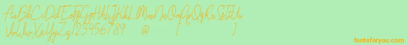 Liberika Oblique Font – Orange Fonts on Green Background