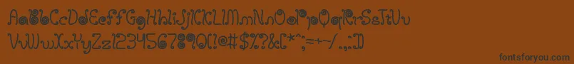 licostrg Font – Black Fonts on Brown Background