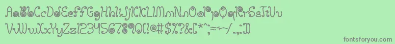 フォントlicostrg – 緑の背景に灰色の文字