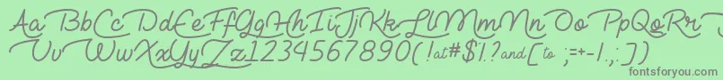Lie to Me  -Schriftart – Graue Schriften auf grünem Hintergrund
