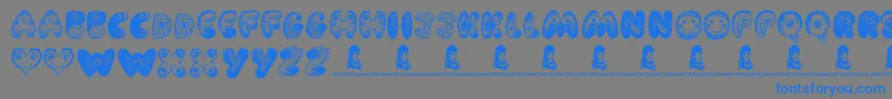 CartoonFreak-Schriftart – Blaue Schriften auf grauem Hintergrund