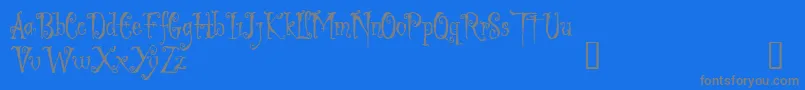 LIGED   -fontti – harmaat kirjasimet sinisellä taustalla