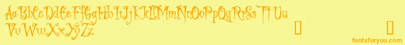 LIGED   -fontti – oranssit fontit keltaisella taustalla