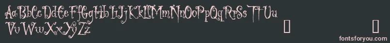 LIGED   -fontti – vaaleanpunaiset fontit mustalla taustalla
