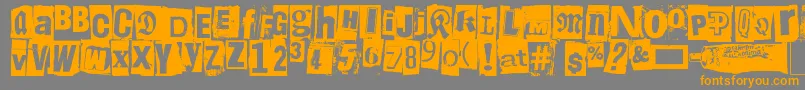 フォントLiima, paperi, sakset2 – オレンジの文字は灰色の背景にあります。