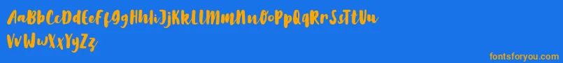 LilyWhite Font – Orange Fonts on Blue Background