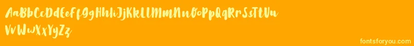 LilyWhite-Schriftart – Gelbe Schriften auf orangefarbenem Hintergrund