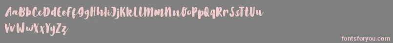 LilyWhite-Schriftart – Rosa Schriften auf grauem Hintergrund