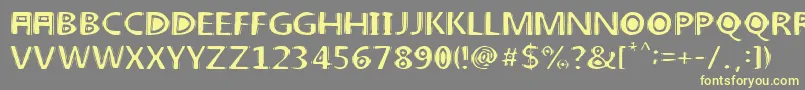 linoleum-fontti – keltaiset fontit harmaalla taustalla