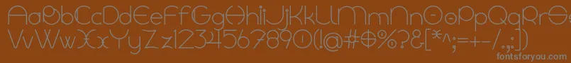 More about Linyat Bilog Font Linyat Bilog Font – Gray Fonts on Brown Background