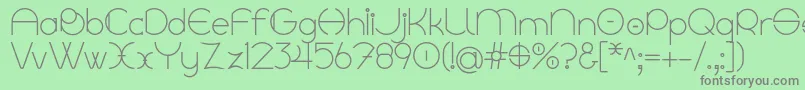 Linyat Bilog-Schriftart – Graue Schriften auf grünem Hintergrund