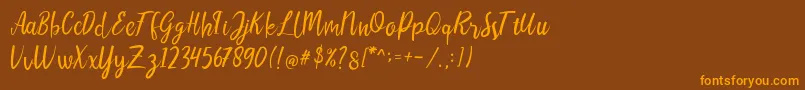 Más sobre la fuente LIONELLOSCRIPTRegular fuente LIONELLOSCRIPTRegular – Fuentes Naranjas Sobre Fondo Marrón