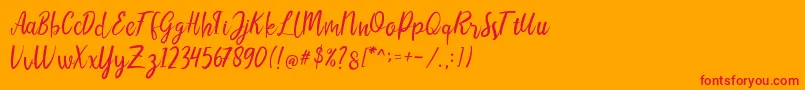LIONELLOSCRIPTRegular Font – Red Fonts on Orange Background