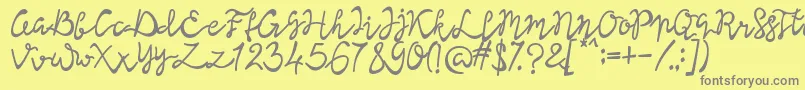 フォントLisna Bold – 黄色の背景に灰色の文字