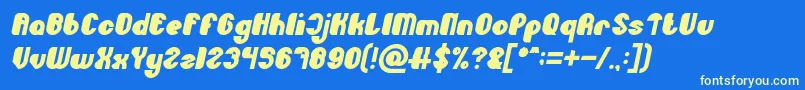 Czcionka Little Atom Bold Italic – żółte czcionki na niebieskim tle