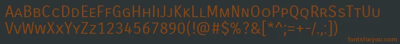 Шрифт CarroisGothicSc – коричневые шрифты на чёрном фоне