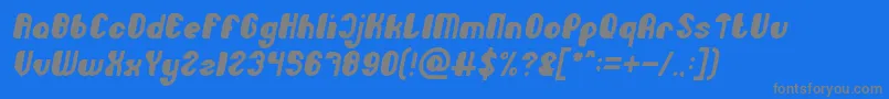 Fonte Little Atom Italic – fontes cinzas em um fundo azul