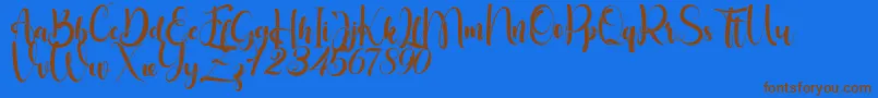 fuente Little Betty – Fuentes Marrones Sobre Fondo Azul
