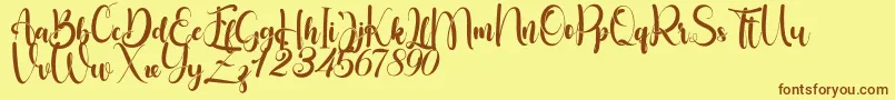 Little Betty Font – Brown Fonts on Yellow Background