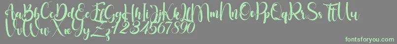 Little Betty Font – Green Fonts on Gray Background