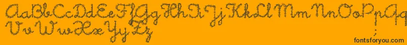 Little Daisy-Schriftart – Schwarze Schriften auf orangefarbenem Hintergrund