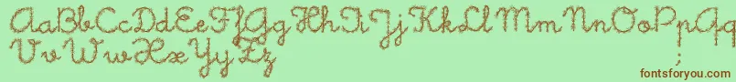 Little Daisy Font – Brown Fonts on Green Background