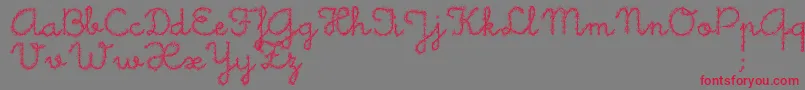 Little Daisy Font – Red Fonts on Gray Background