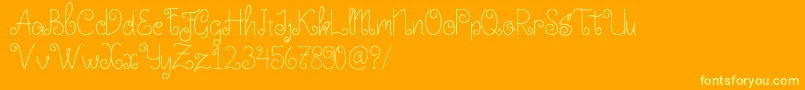 Little Edward Font – Yellow Fonts on Orange Background