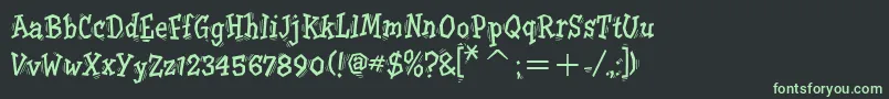 フォントTremoritcTt – 黒い背景に緑の文字