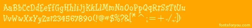 TremoritcTt Font – Yellow Fonts on Orange Background
