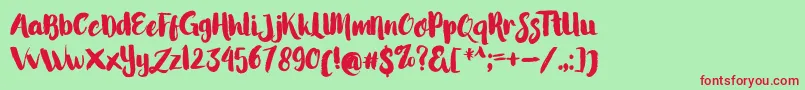 LittleStarsBrush-Schriftart – Rote Schriften auf grünem Hintergrund