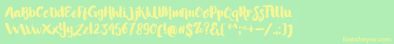 LittleStarsBrush Font – Yellow Fonts on Green Background