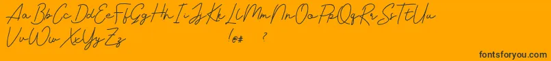 Livvie Signature Font – Black Fonts on Orange Background
