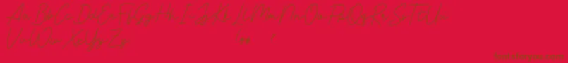 Livvie Signature Font – Brown Fonts on Red Background