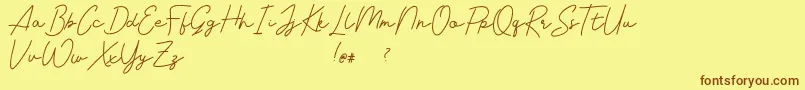 Livvie Signature Font – Brown Fonts on Yellow Background