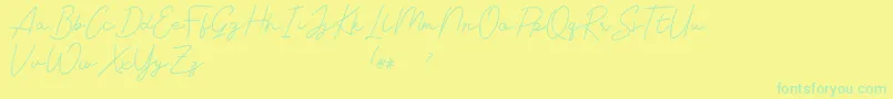 Livvie Signature-Schriftart – Grüne Schriften auf gelbem Hintergrund
