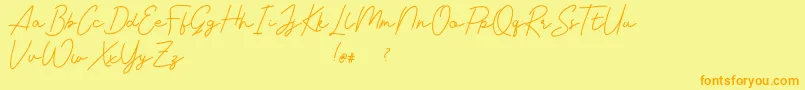 Livvie Signature Font – Orange Fonts on Yellow Background