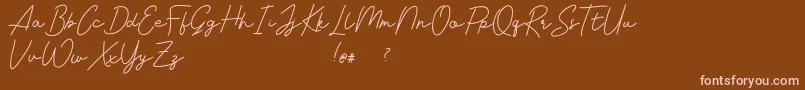 フォントLivvie Signature – 茶色の背景にピンクのフォント