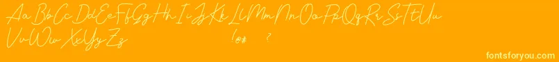 Livvie Signature Font – Yellow Fonts on Orange Background
