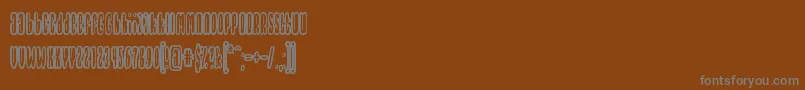 Шрифт Thrownupreal – серые шрифты на коричневом фоне