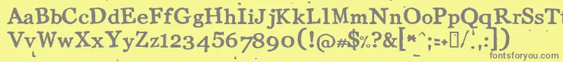 フォントLLCOT    – 黄色の背景に灰色の文字