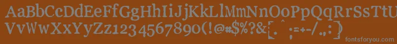 LLPEW   -fontti – harmaat kirjasimet ruskealla taustalla