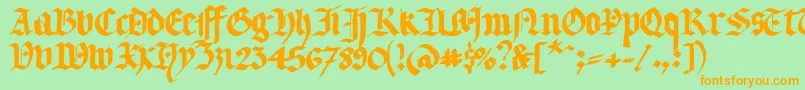 フォントLLTERG   – オレンジの文字が緑の背景にあります。